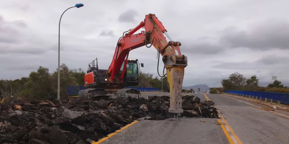 obras carretera excavadora firme carretera