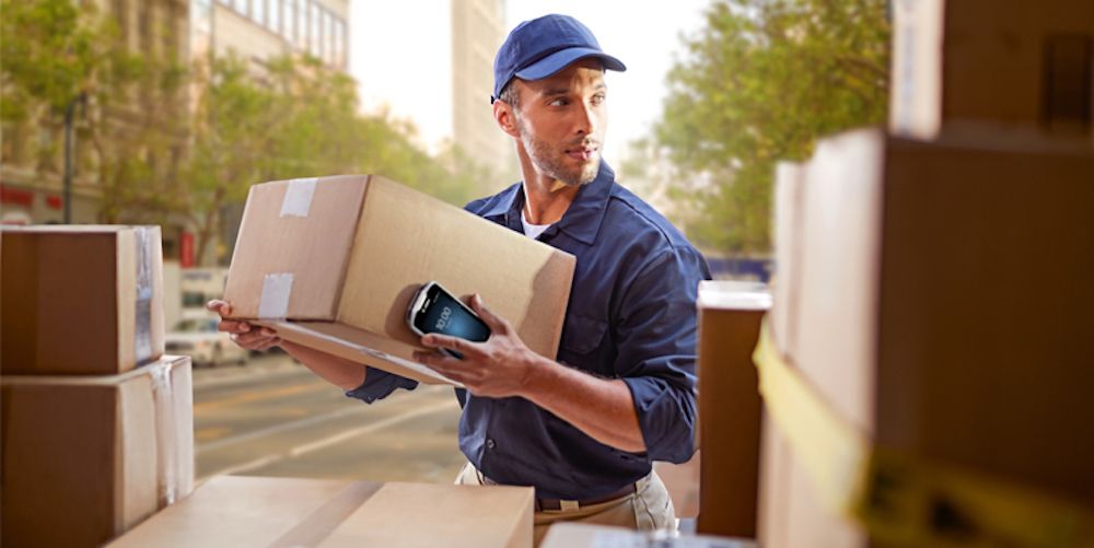 TAndL, Photography Website, Delivery Man Holding Box, 16x9 ratio, 800x450, 72dpi