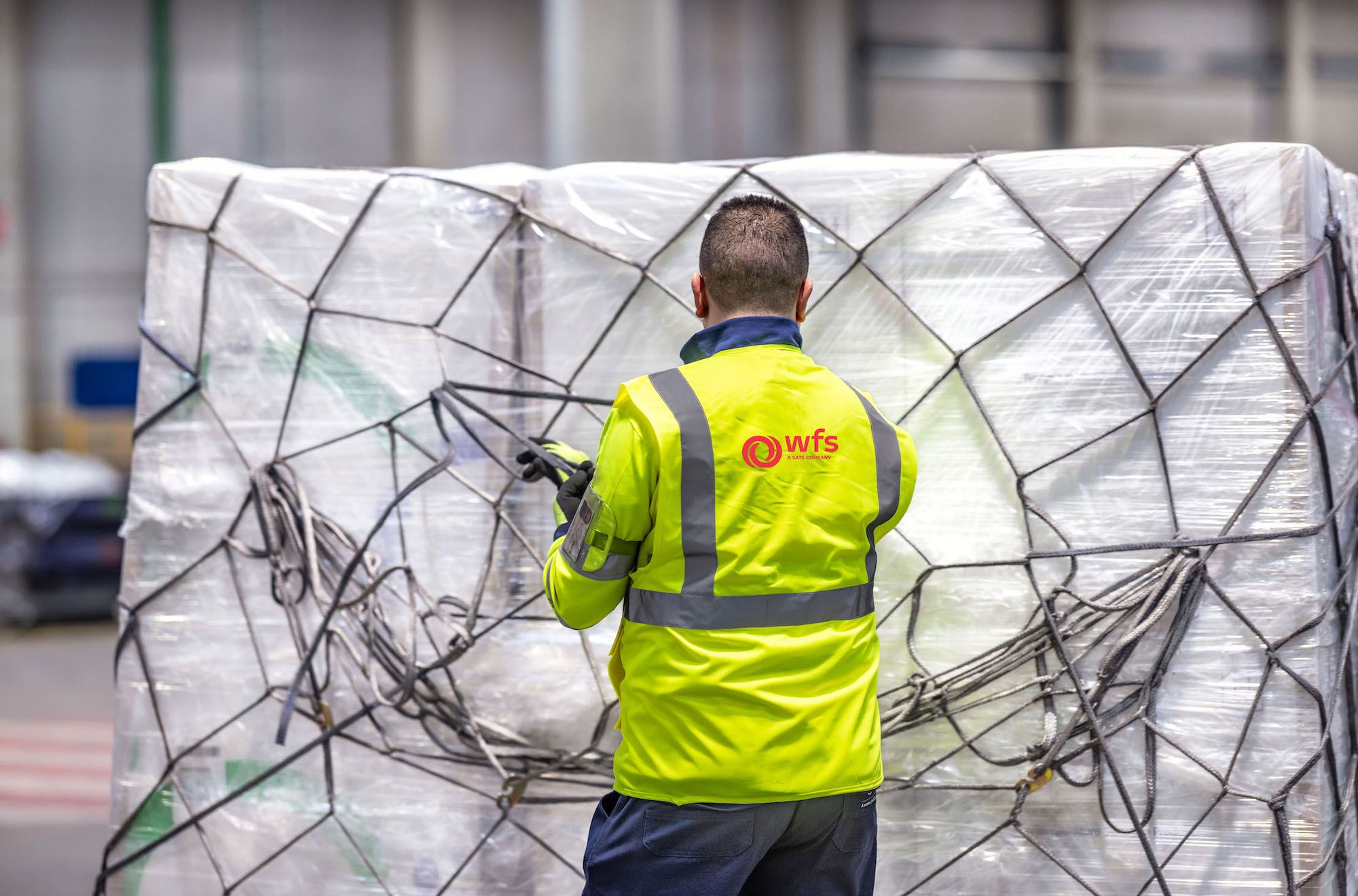 Trabajador WFS carga aerea