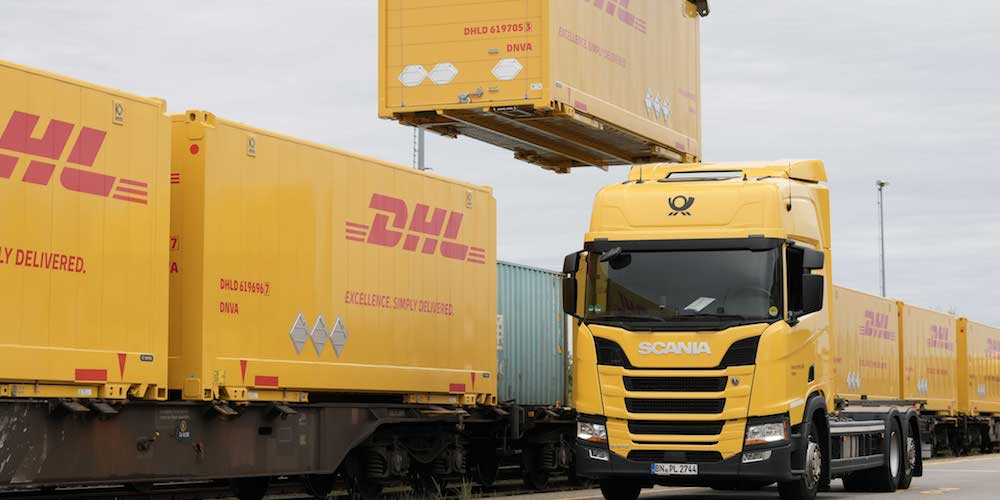 Ferrocarril Camion Scania DHL contenedores
